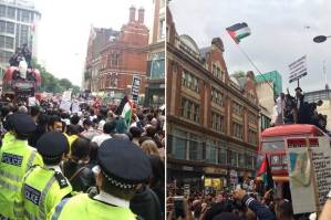 During London protests against Israel's renewed attacks on Gaza, anti-Zioniost rabbis stand on top of a double decker bus in Kensington High Street. Photos from Twitter/@EAli1 and @ImaniAmrani